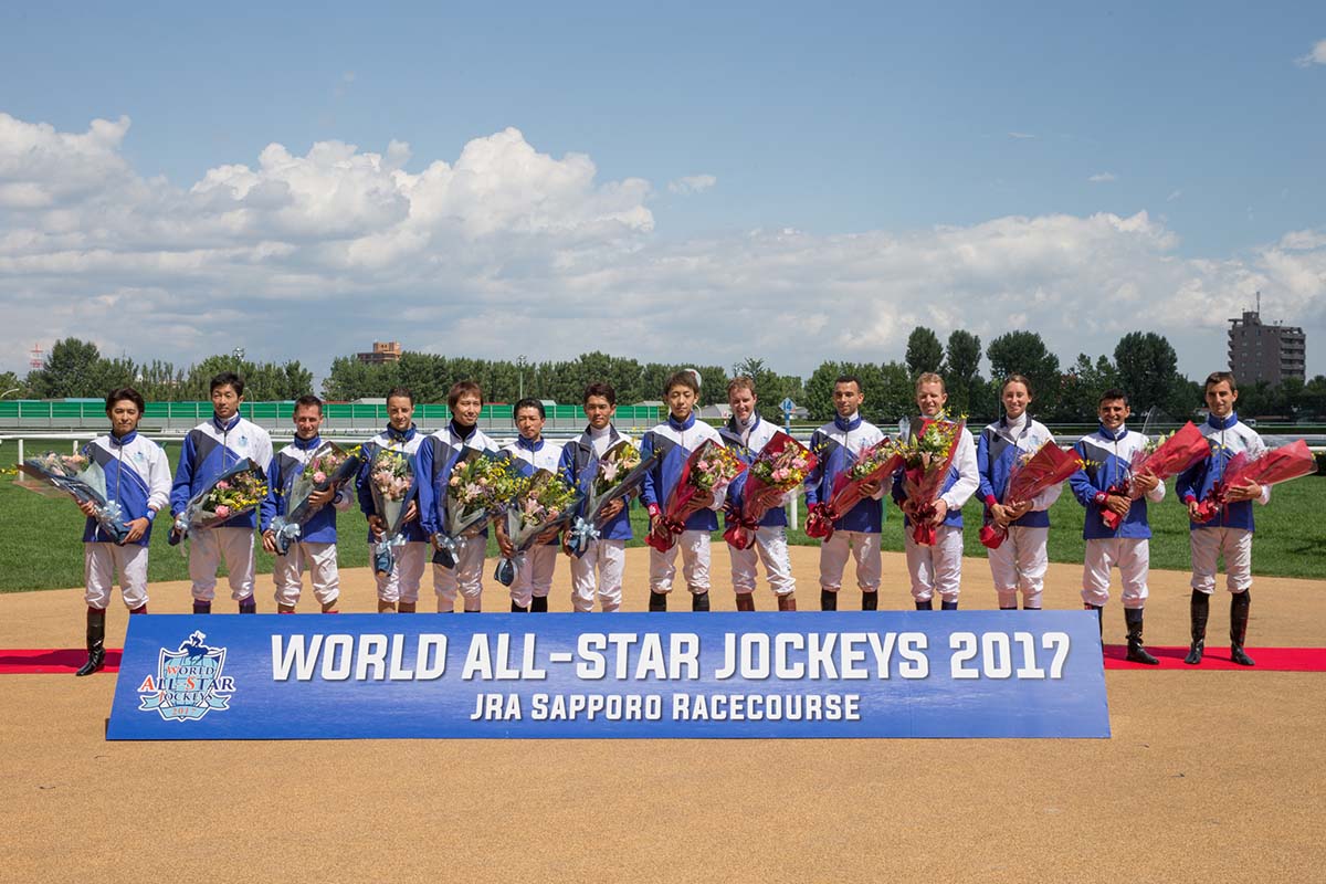 Joao Moreira (5th from right) makes an appearance with all World All-Star Jockeys series competitors at Sapporo Racecourse today.