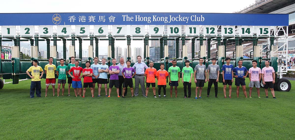Anthony Kelly (10th from left), Club’s Executive Director, Racing Business and Operations, Andrew Harding (12th from left), Executive Director, Racing Authority, and all participants of the annual Jockeys’ Sprint pose for a group photo before the contest.