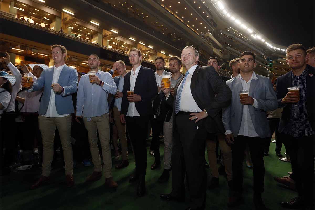 Members of the Richmond Tigers, winners of the Australian Football League Grand Final, enjoy the Oktoberfest party at Happy Valley Racecourse with Mr. Winfried Engelbrecht-Bresges, Chief Executive Officer, The Hong Kong Jockey Club.