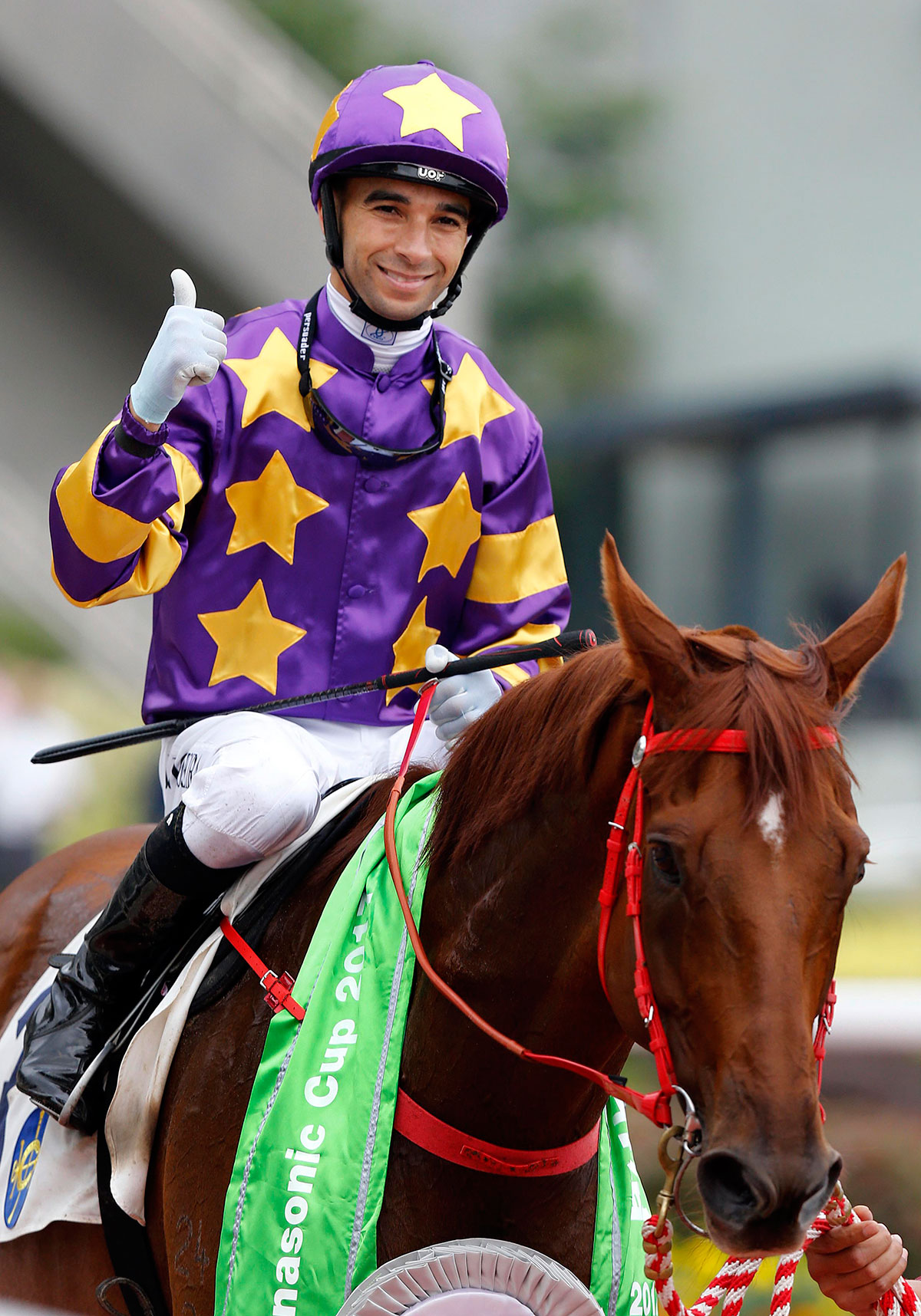 Joao Moreira gives a thumbs up as he returns aboard Panasonic Cup winner Western Express.