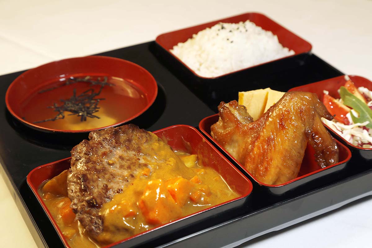 Japan - Beef Burger with Curry Sauce, Teriyaki Chicken Wings, Egg Roll & Cabbage Salad Bento $80