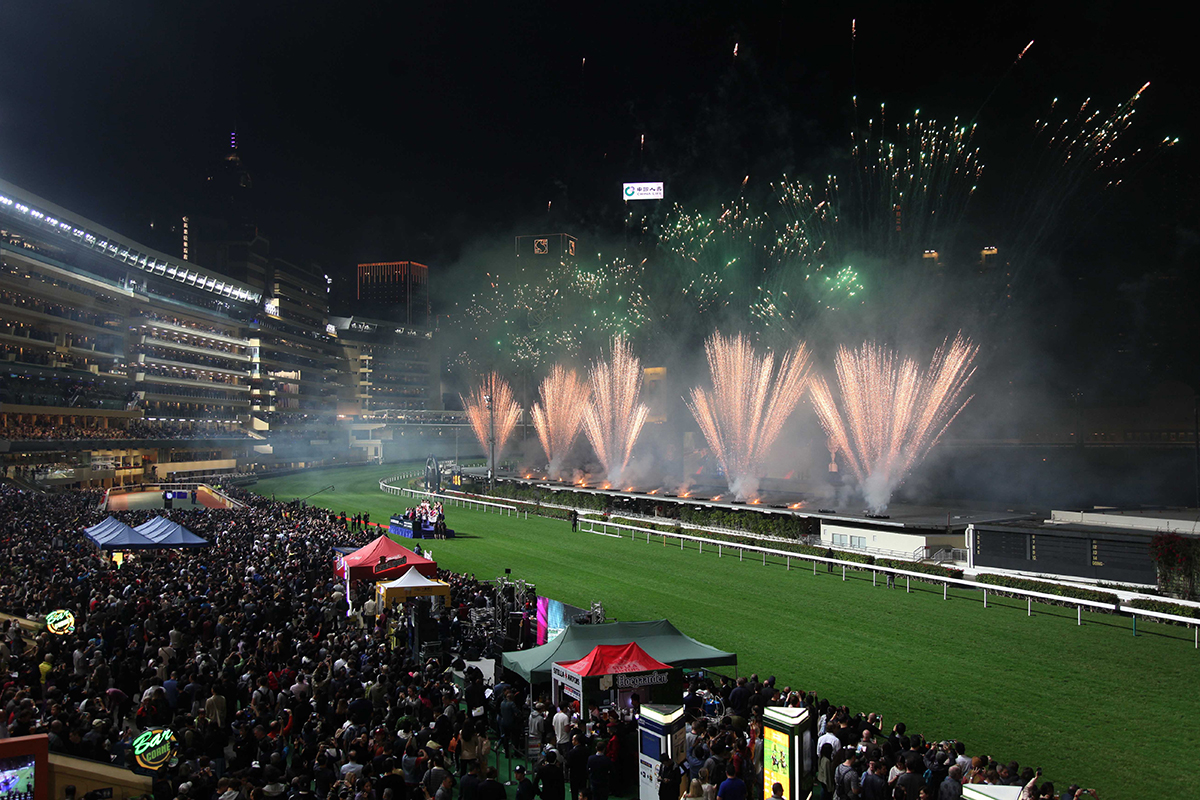 A pyrotechnics display lights up the Happy Valley sky during the opening ceremony.