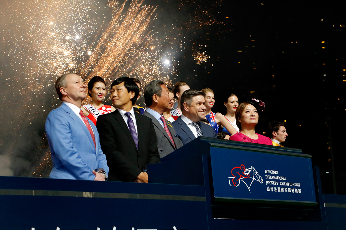 first row from left: Mr Winfried Engelbrecht-Bresges, Chief Executive Officer of the Club, Mr Yeung Tak-keung, Commissioner for Sports, Home Affairs Bureau of the Hong Kong Special Administrative Region, Dr Simon S O Ip, Chairman of the Club, Mr Juan-Carlos Capelli, Vice President of LONGINES and Head of International Marketing, Ms Karen Au Yeung, Vice President of LONGINES Hong Kong accompanied by the 12 participating jockeys, jointly officiate at the ceremony.
