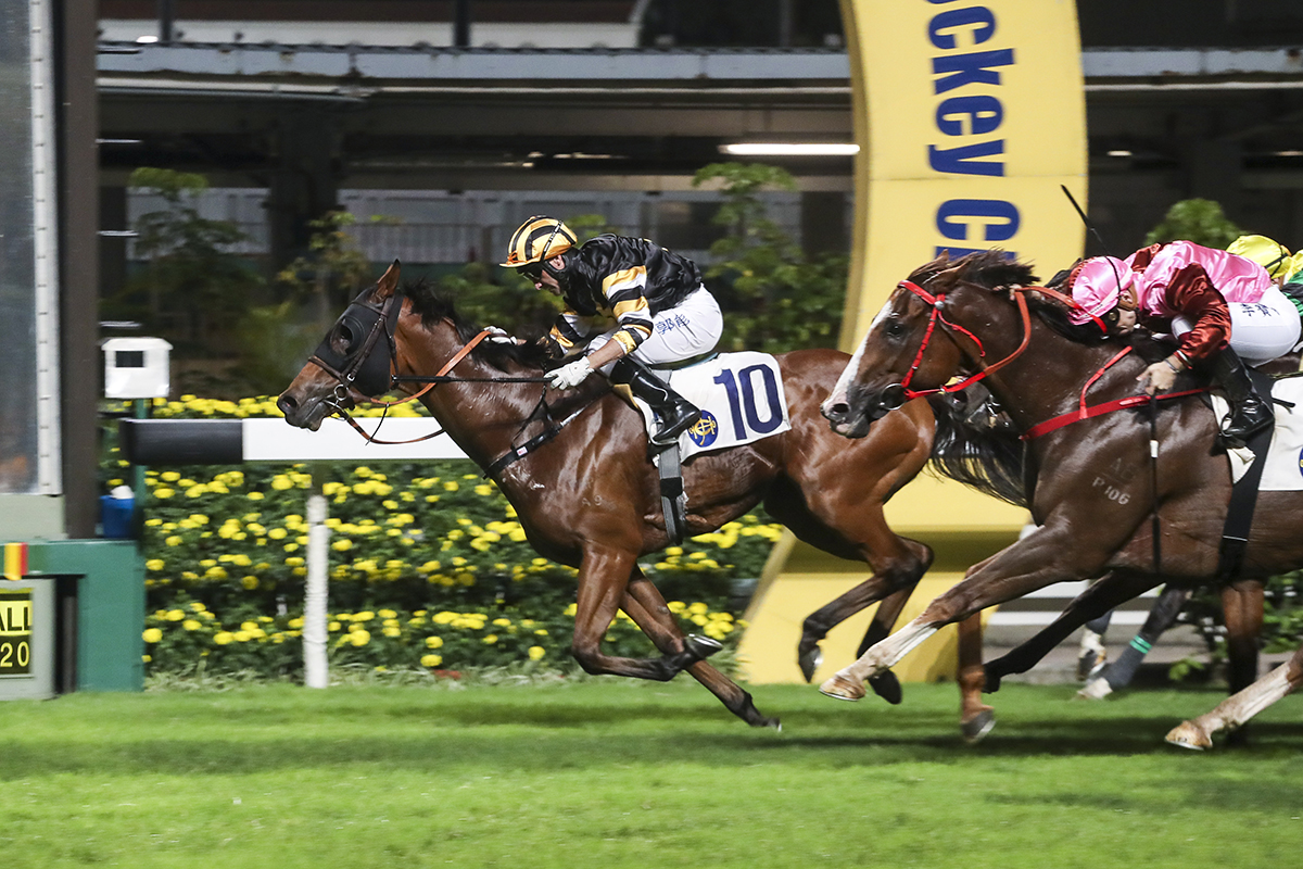Neil Callan steers Powermax to victory over 1200m at Happy Valley last May.