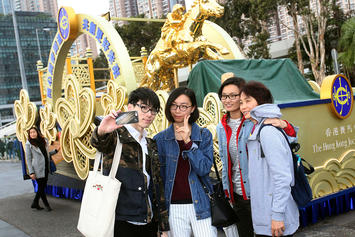 The Club’s CNY float themed “Striding On For Prosperity” is displayed at Sha Tin Racecourse for racegoers to take photos.