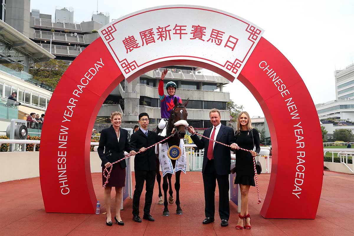 Winning connections of Singapore Sling celebrate his victory after the race.