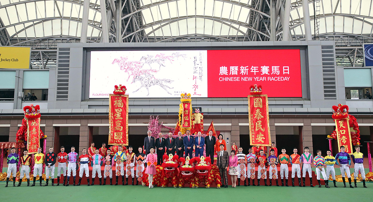 Officiating guests join for a group photo at the opening ceremony of the Chinese New Year Raceday. From left (photo 3): HKJC Steward Mrs. Margaret Leung HKJC Steward Mr. Stephen Ip Shu Kwan HKJC CEO Mr. Winfried Engelbrecht-Bresges HKJC Chairman Dr. Simon S O Ip HKJC Deputy Chairman Mr. Anthony W K Chow HKJC Steward Mr. Lester C H Kwok HKJC Steward The Hon. Sir C K Chow HKJC Steward Mr. Silas S S Yang