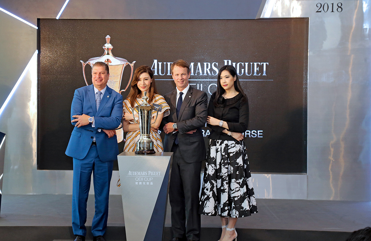 All officiating guests at today’s Selections Announcement join for a group photo - Andrew Harding, Executive Director, Racing, HKJC, William A. Nader, Director, Racing Business & Operations, HKJC, and Fanna Chow, Head of Marketing and Communication, Audemars Piguet(right) and Audemars Piguet QEII Cup Ambassador Michele Reis.