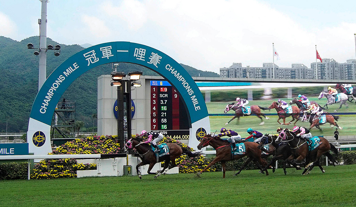 Beauty Generation (No. 1), trained by John Moore and ridden by Zac Purton, wins the Group 1 Champions Mile at Sha Tin Racecourse today. Western Express and Southern Legend finish second and third respectively in this HK$18 million event.