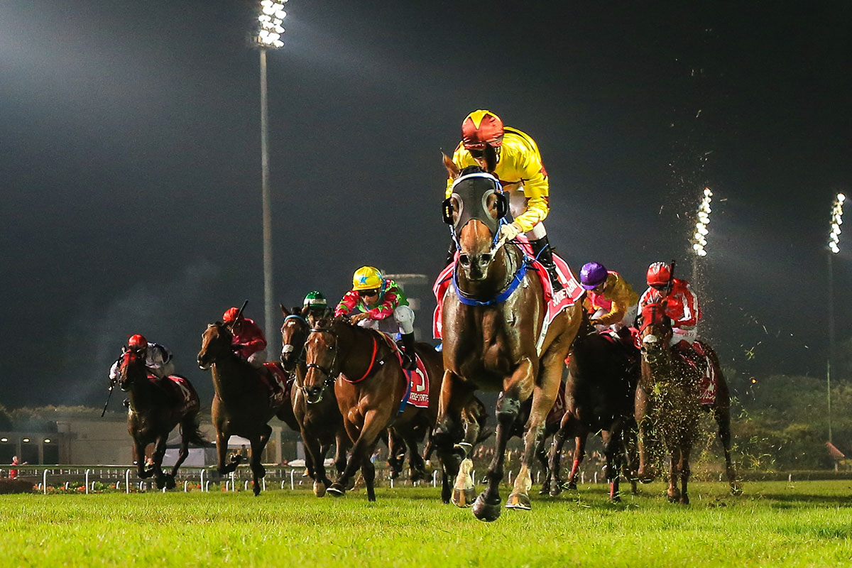 Southern Legend and Horse Of Fortune (yellow cap) finish one-two for Hong Kong in the Kranji Mile.