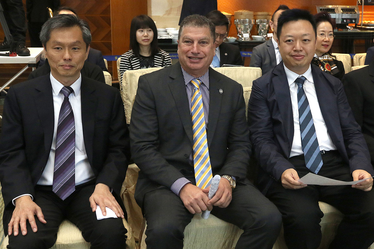 (From left) Kwang Eng Seong, Operations Controller of the Macau Jockey Club; William Nader, Director of Racing Business & Operations of the Hong Kong Jockey Club; and Thomas Li, Executive Director and Chief Executive of the Macau Jockey Club (right) pose for the cameras at the Hong Kong Macau Trophy 2018 barrier draw ceremony.
