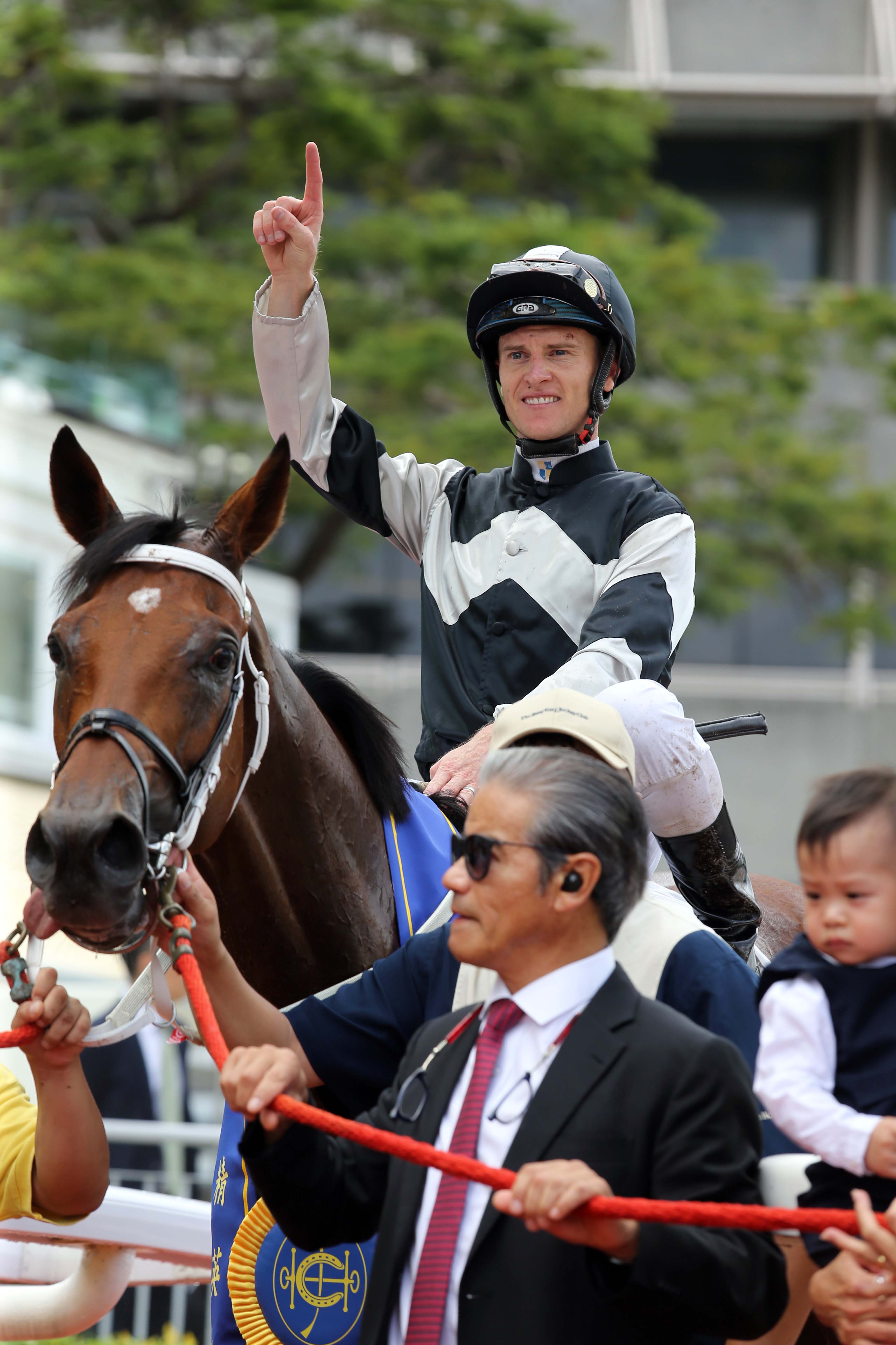 Zac Purton celebrates another win in his quest for the champion jockey title.