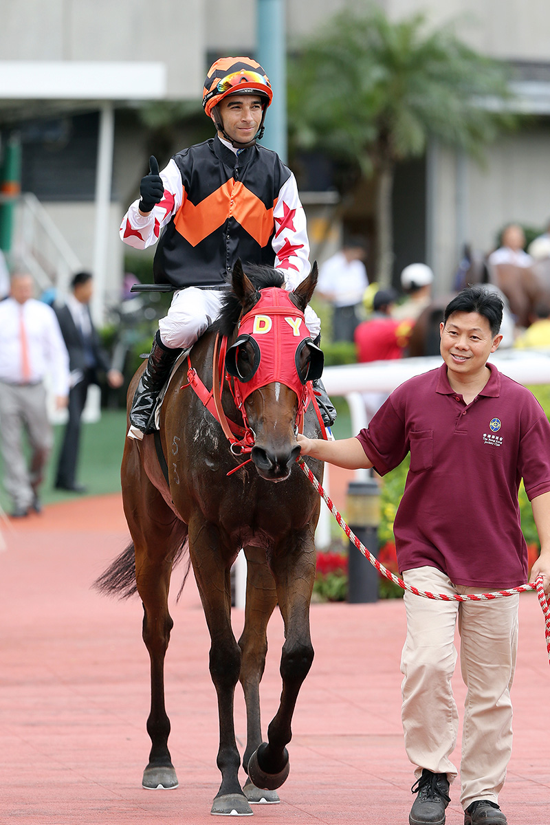 Joao Moreira completes his four-timer aboard the Dennis Yip-trained Winning Controller.
