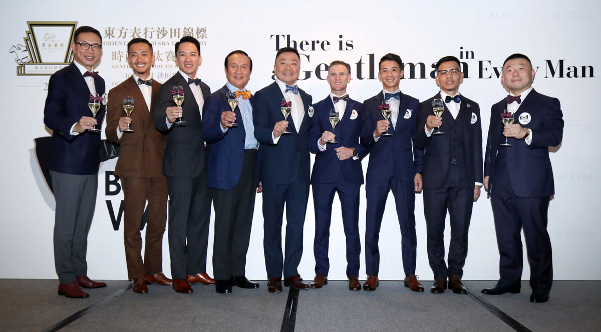 All guests toast to the success of the Oriental Watch Sha Tin Trophy “Gentlemen’s Bow Tie Raceday” to be held on 21 October. From right: Dr. Albert Wong, MH, President of Eastern Worldwide Co Ltd cum President of Hong Kong Guoshu Association, Trainer Mr. Frankie Lor, Jockey Mr. Derek Leung, Champion Jockey Mr. Zac Purton, Mr. Dennis Yeung, Managing Director of Oriental Watch Holdings Limited, Renowned actor Mr. Samuel Kwok, Renowned actor Mr. Jason Chan, Mr. Alan See, Co-founder of The Armoury, Mr. Carson Chan, Head of Mission, Greater China, Fondation de la Haute Horlogerie