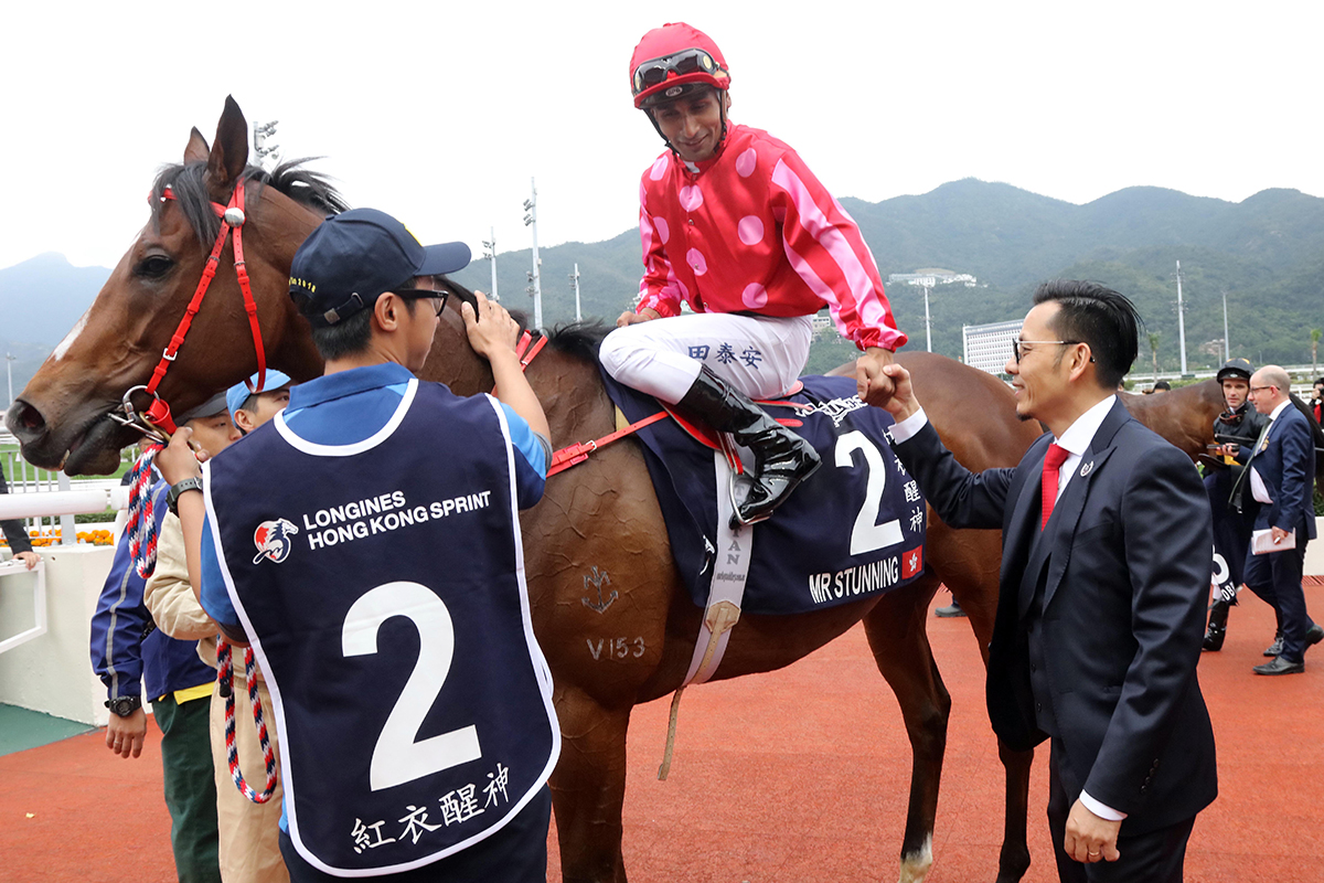 Mr Stunning’s jockey Karis Teetan, trainer Frankie Lor, owner’s friend and related connections celebrate their success after taking the LONGINES Hong Kong Sprint.