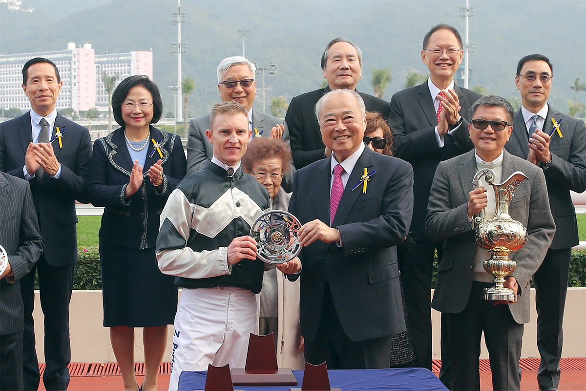 The Hon Sir C K Chow, Club Steward, presents the Centenary Vase trophy and silver dishes to Exultant’s Owner Eddie Wong Ming Chak, winning trainer Tony Cruz and jockey Zac Purton.