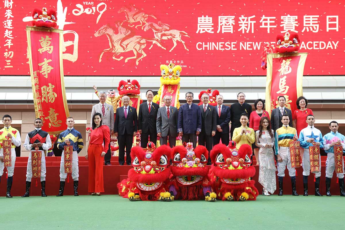 Officiating guests join for a group photo at the opening ceremony of the Chinese New Year Raceday. From left (photo 3): HKJC Steward Dr Rosanna Wong Yick Ming, HKJC Steward Mr Silas S S Yang, HKJC Steward The Hon Sir C K Chow, HKJC Steward Mr Philip N L Chen, HKJC CEO Mr Winfried Engelbrecht-Bresges, HKJC Chairman Dr Anthony W K Chow, The Hon Paul Chan Mo-po, the Financial Secretary of the HKSAR Government, HKJC Deputy Chairman Mr Lester C H Kwok, HKJC Steward Mr Stephen Ip Shu Kwan, HKJC Steward Mr Richard Tang Yat Sun