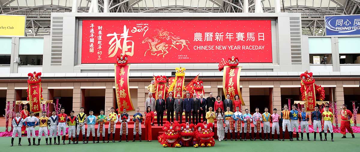 Officiating guests join for a group photo at the opening ceremony of the Chinese New Year Raceday. From left (photo 3): HKJC Steward Dr Rosanna Wong Yick Ming, HKJC Steward Mr Silas S S Yang, HKJC Steward The Hon Sir C K Chow, HKJC Steward Mr Philip N L Chen, HKJC CEO Mr Winfried Engelbrecht-Bresges, HKJC Chairman Dr Anthony W K Chow, The Hon Paul Chan Mo-po, the Financial Secretary of the HKSAR Government, HKJC Deputy Chairman Mr Lester C H Kwok, HKJC Steward Mr Stephen Ip Shu Kwan, HKJC Steward Mr Richard Tang Yat Sun