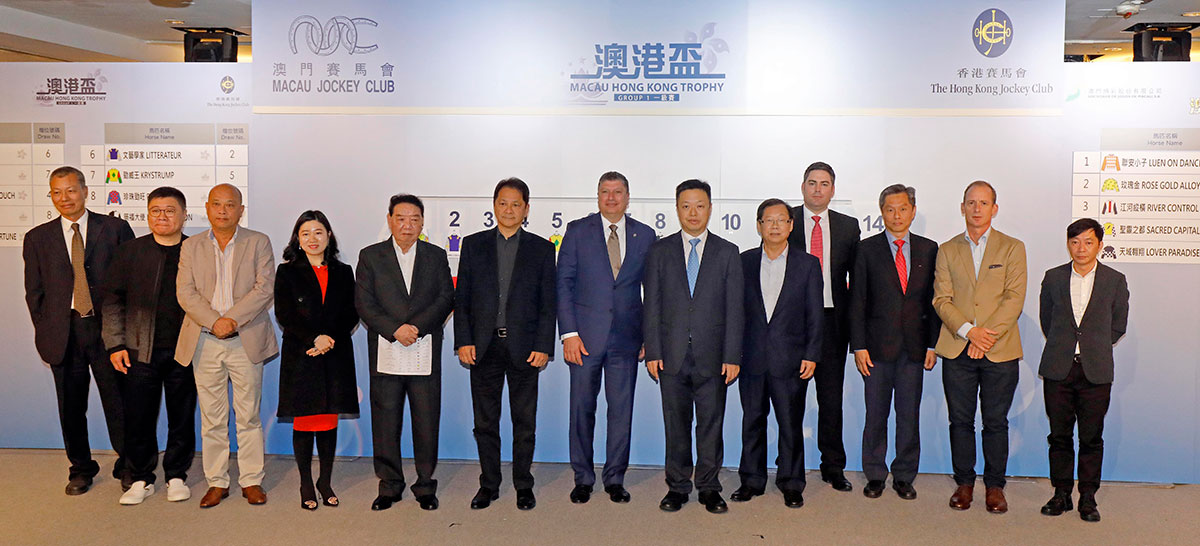 William Nader and senior executives of the MJC, horse connections and guests smile for cameras at 2019 Macau Hong Kong Trophy barrier draw ceremony.