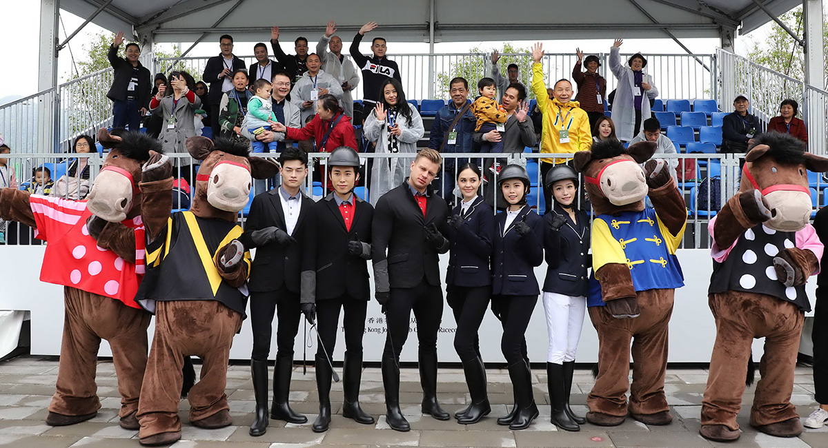 Members of the public play horse-themed games during the event.