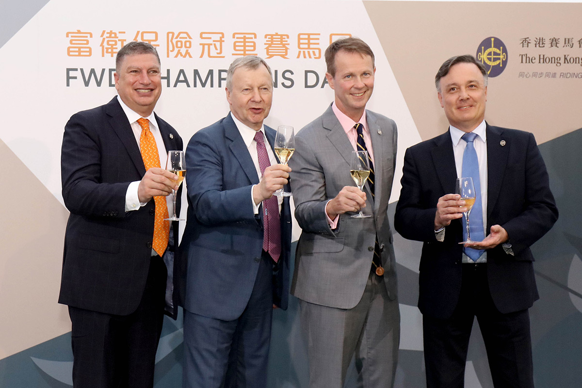 Winfried Engelbrecht-Bresges, CEO of the Hong Kong Jockey Club (2nd left), Andrew Harding, Executive Director, Racing (2nd right); Bill Nader, Director of Racing Business and Operations (1st left); and Nigel Gray, Head of Handicapping, Race Planning and International Racing (1st right), toast a successful FWD Champions Day.