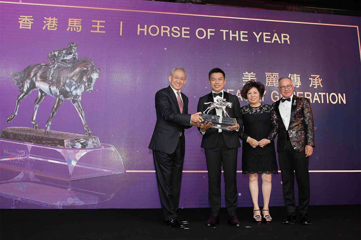 Beauty Generation is crowned Horse of the Year: Dr. Anthony W K Chow, Chairman of The Hong Kong Jockey Club, presents the trophy to owner Mr. Patrick Kwok Ho Chuen, accompanied by Dr. Simon Kwok, Dr. Eleanor Kwok. The Kwok family celebrates after receiving the awards.