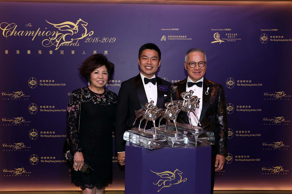 Beauty Generation is crowned Horse of the Year: Dr. Anthony W K Chow, Chairman of The Hong Kong Jockey Club, presents the trophy to owner Mr. Patrick Kwok Ho Chuen, accompanied by Dr. Simon Kwok, Dr. Eleanor Kwok. The Kwok family celebrates after receiving the awards.