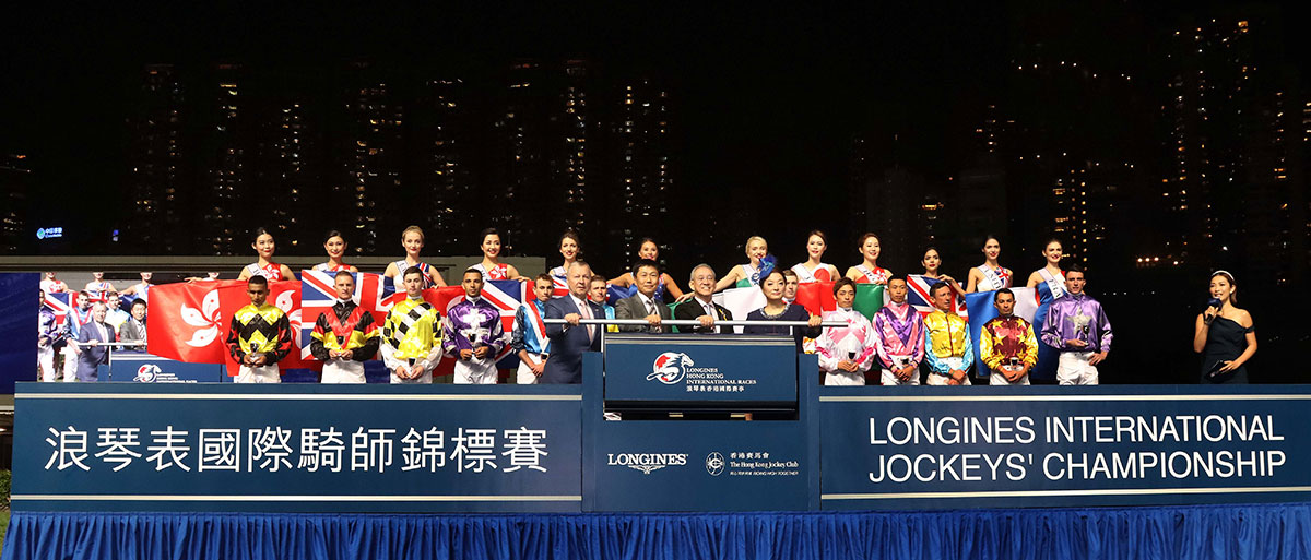 First row from left: Mr Winfried Engelbrecht-Bresges, Chief Executive Officer of the Club; Mr Yeung Tak-keung, Commissioner for Sports, Home Affairs Bureau of the Hong Kong Special Administrative Region Government; Dr Anthony W K Chow, Chairman of the Club; Ms Karen Au Yeung, Vice President of LONGINES Hong Kong, accompanied by the 12 participating jockeys, jointly officiate at the ceremony.