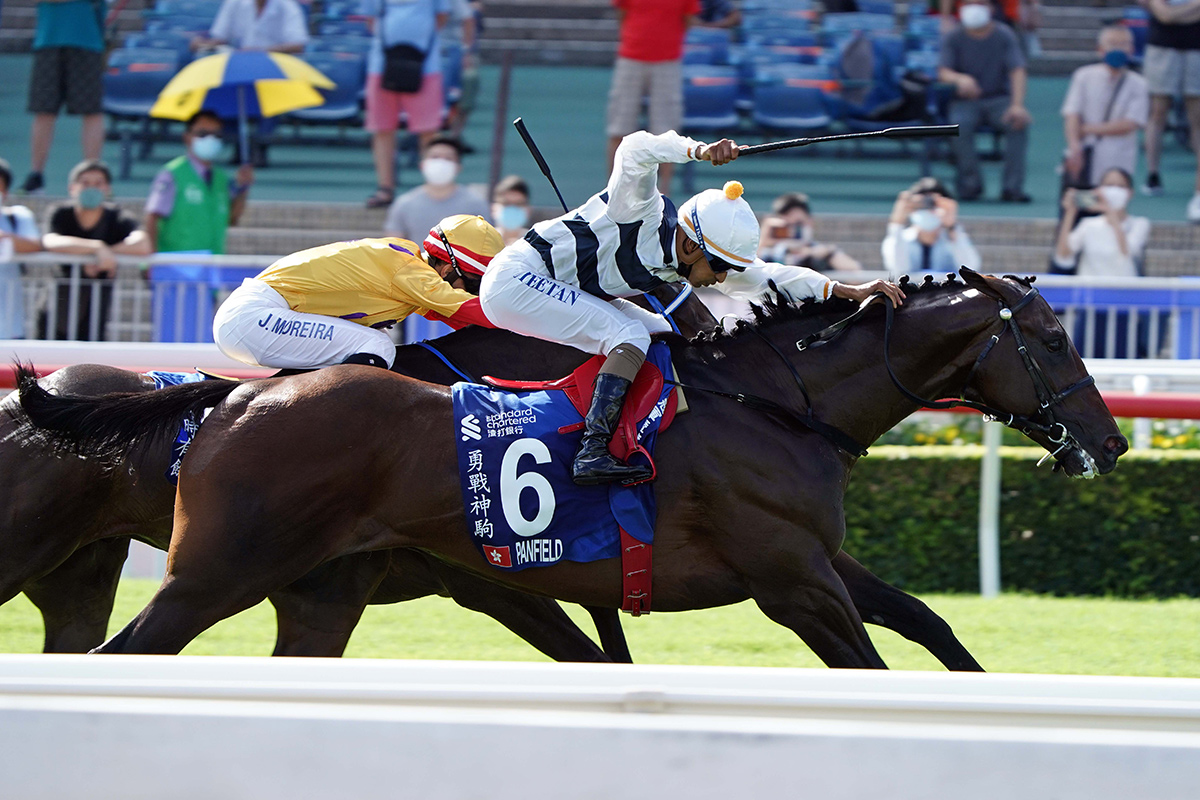 The Anthony Millard-trained Panfield (No. 6), with Karis Teetan on board, wins in the G1 Standard Chartered Champions & Chater Cup (2400m) at Sha Tin Racecourse today.