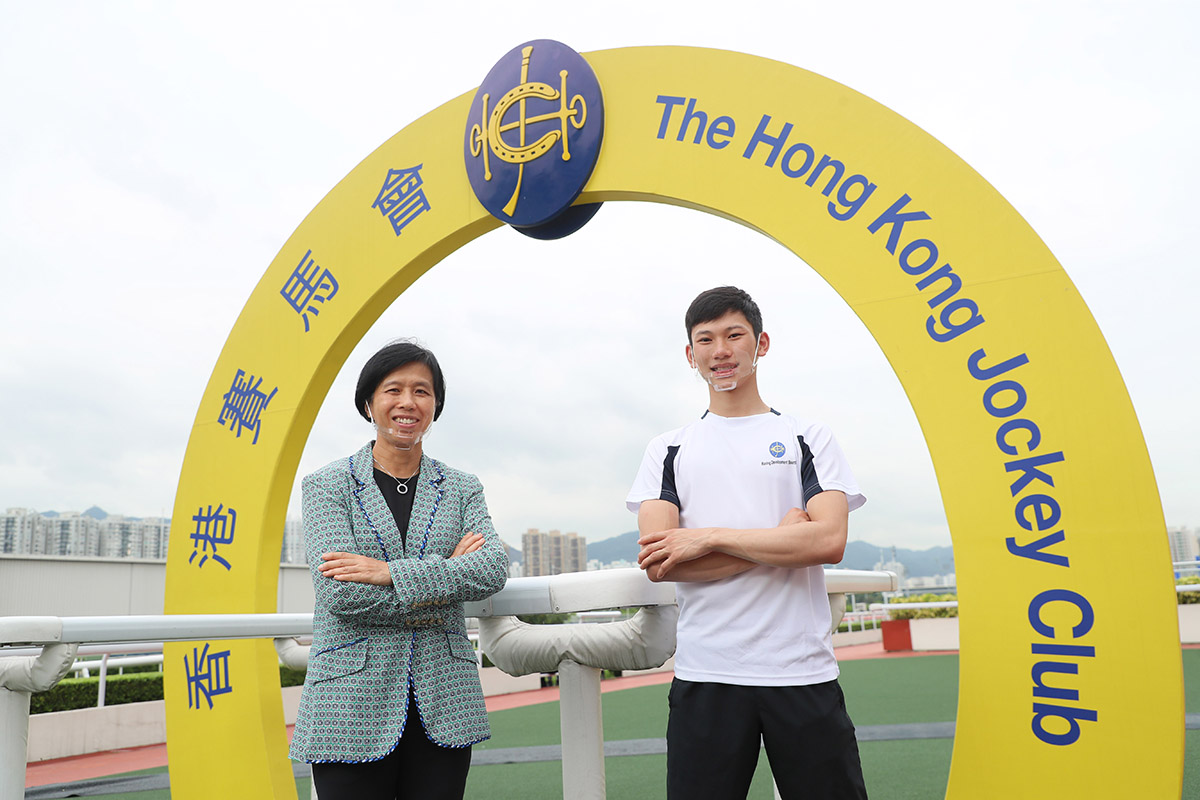 Amy Chan, the Club’s Racing Development Board Executive Manager and Headmistress of the Apprentice Jockeys’ School, and Apprentice Jockey Jerry Chau.