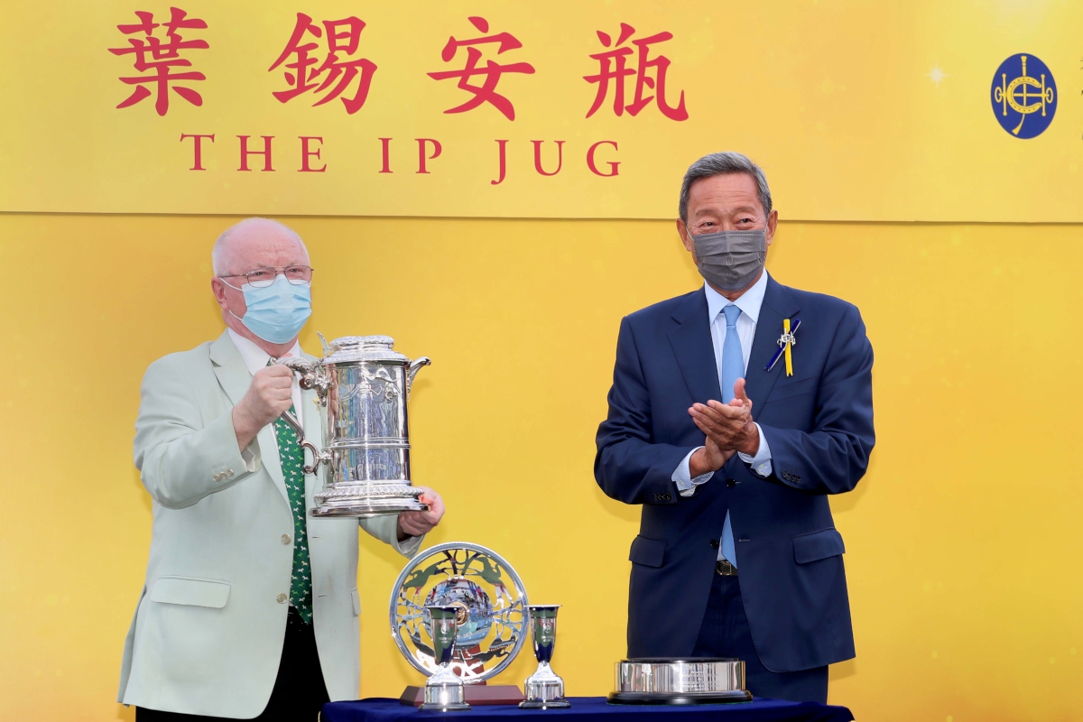 Mister Snowdon wins The Ip Jug for Owner Michael John Caddy, Trainer Douglas Whyte and Jockey Jerry Chau. Dr Simon Ip presents the Jug to the winning Owner.
