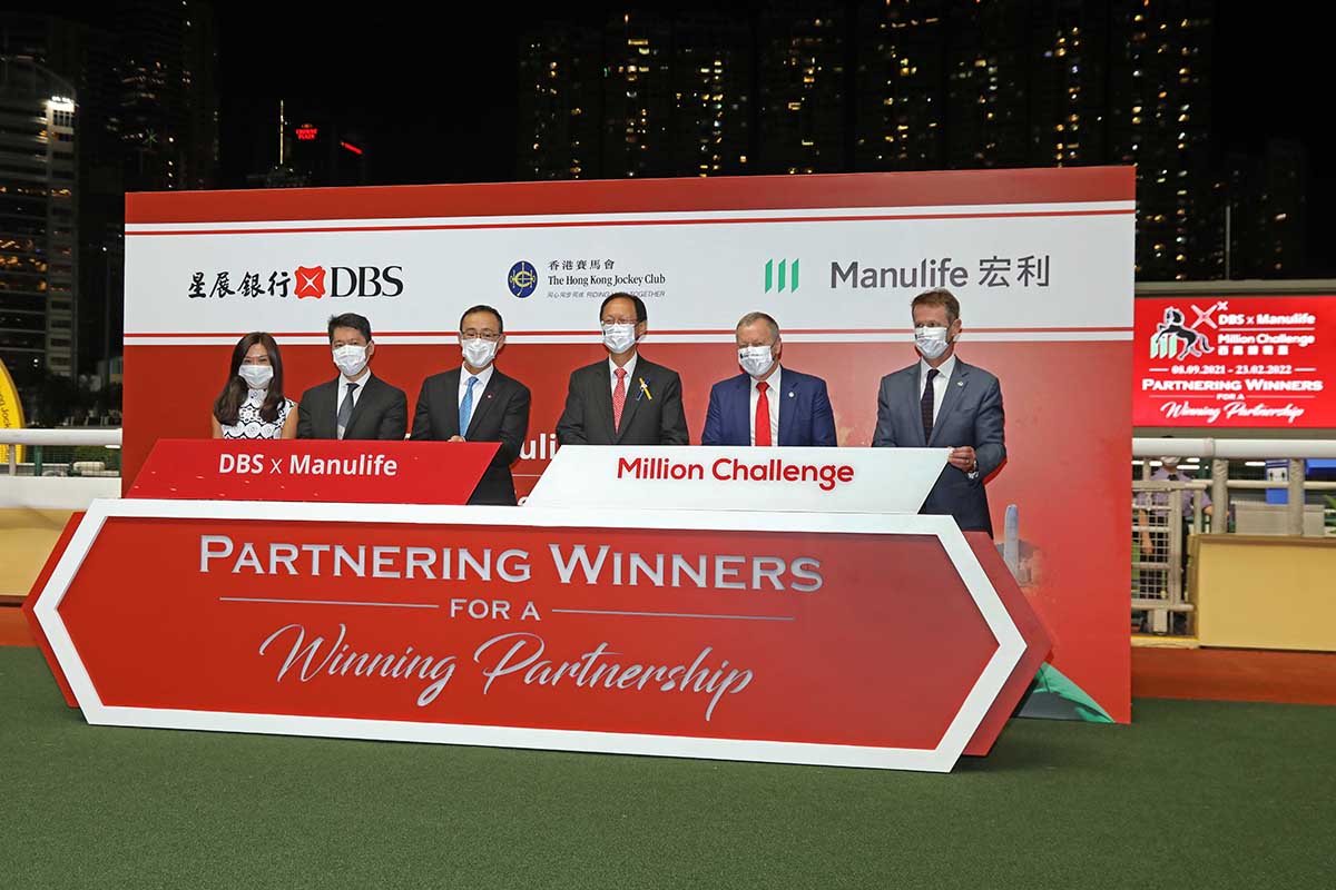 The 2021/22 season DBS x Manulife Million Challenge kicked off with an opening ceremony tonight. Officiating guests were (from left): Ms Tracy Leung, Vice President, Chief Partnership Distribution Officer, Manulife (International) Limited; Mr Wing Lo, Managing Director, Head of Bancassurance, Consumer Banking Group and Wealth Management, Hong Kong, DBS Bank (Hong Kong) Limited; Mr. Stanley Wu, Managing Director & Treasures & Distribution Head, Consumer Banking Group and Wealth Management, Hong Kong, DBS Bank (Hong Kong) Limited; Mr. Philip Chen, HKJC Chairman; Mr. Winfried Engelbrecht-Bresges, HKJC CEO; Mr. Andrew Harding, HKJC Executive Director, Racing.