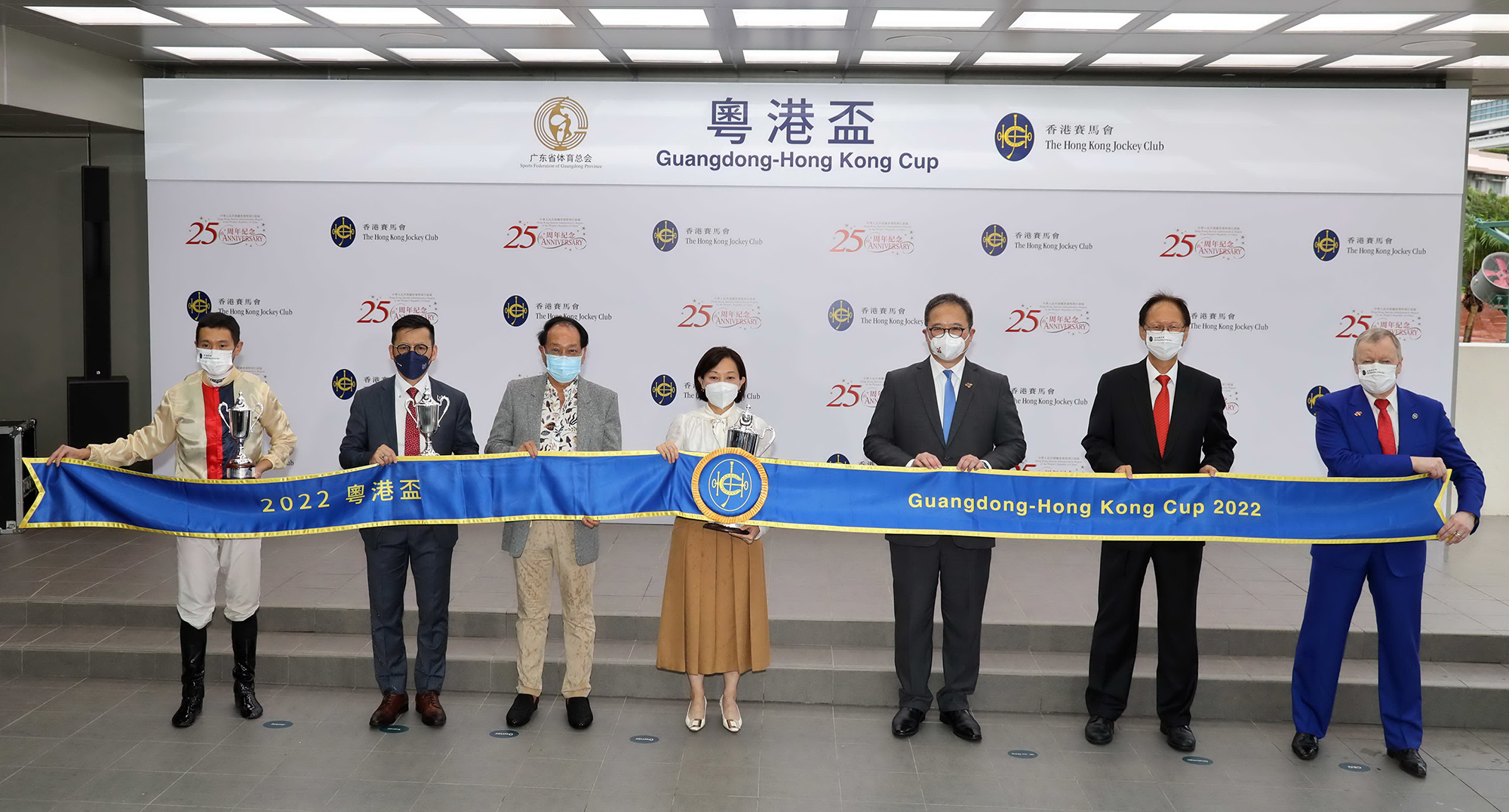 Permanent Secretary for Culture, Sports and Tourism of the HKSAR Government, Joe Wong (3rd right); Club Chairman Philip Chen (2nd right) and Club Chief Executive Officer Winfried Engelbrecht-Bresges (1st right) at the Guangdong-Hong Kong Cup trophy presentation ceremony.