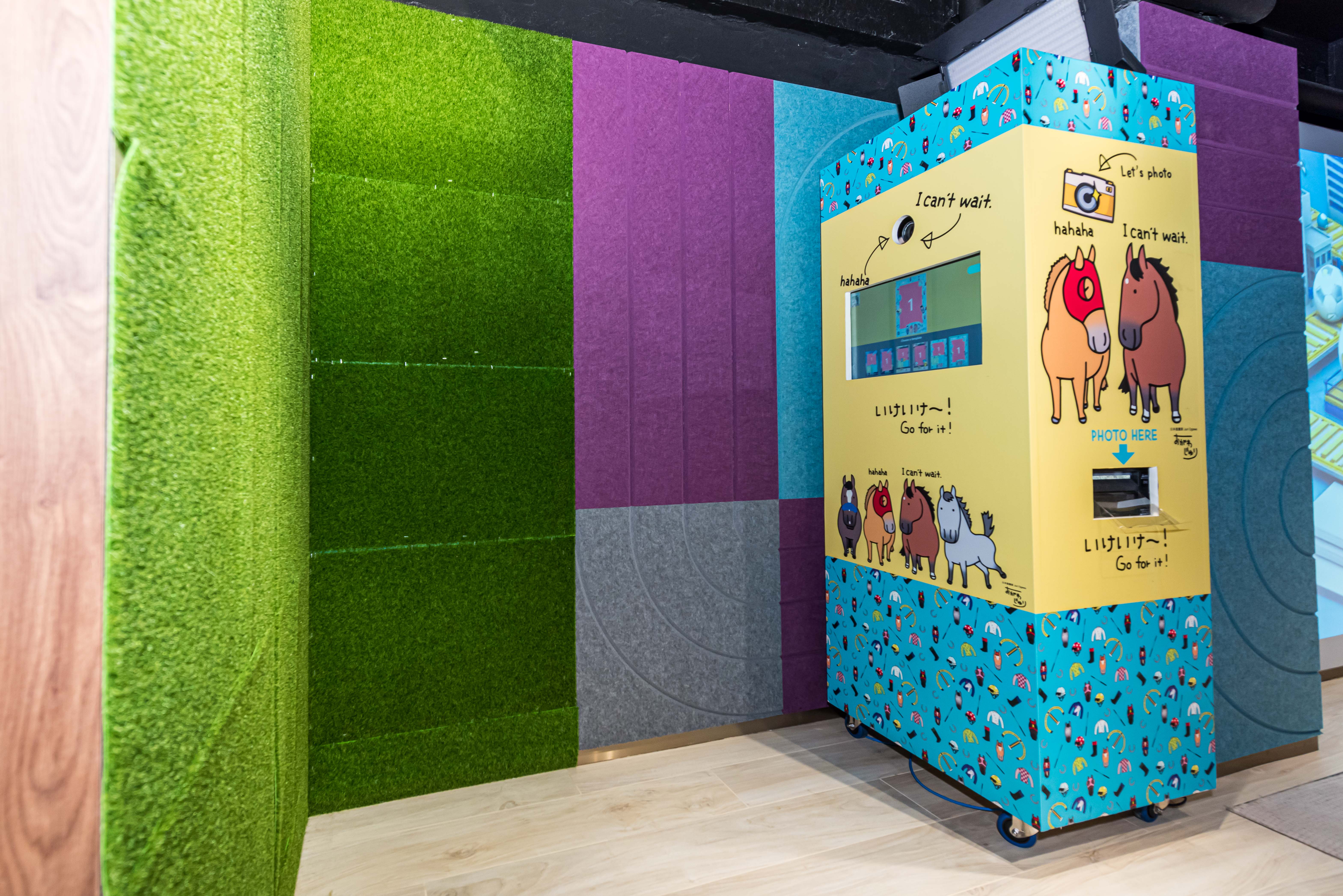 The photo booth, only available for a limited period, takes pictures of customers decorated with adorable horse and football cartoon.